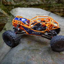 Axial RBX10 Ryft 1/10 Orange 4WD Brushless Rock Bouncer versione RTR senza batterie (art. AXI03005T1)